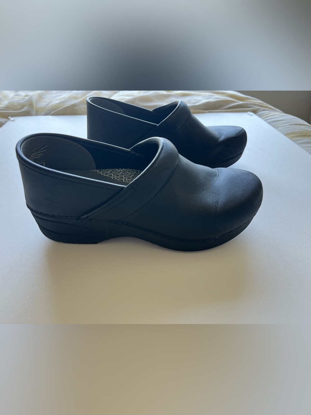 Dansko Black Leather Slip-On Clogs